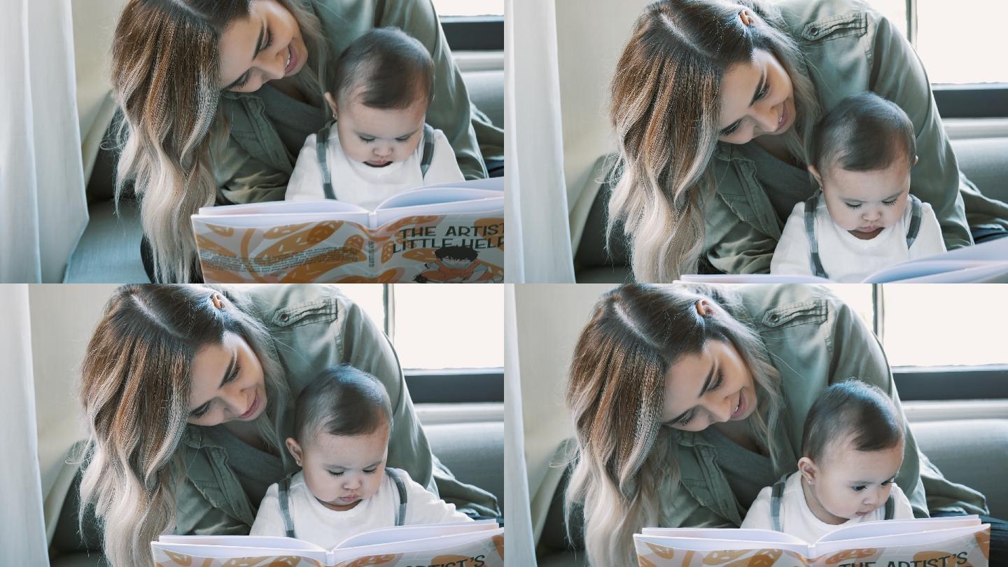 妈妈给小女儿读一本图画书