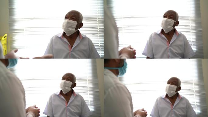 戴口罩接受医疗咨询的患者