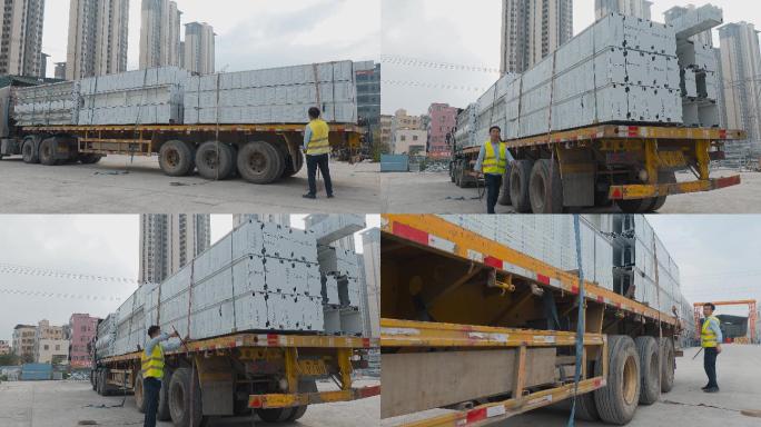 卡车司机捆绑货物卡车运输建筑材料