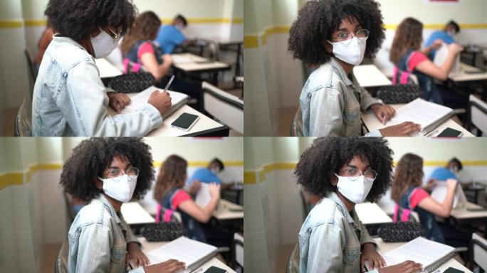 教室里戴着口罩的学生肖像