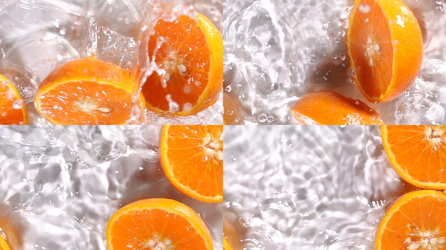 橙子片落在水上飞溅
