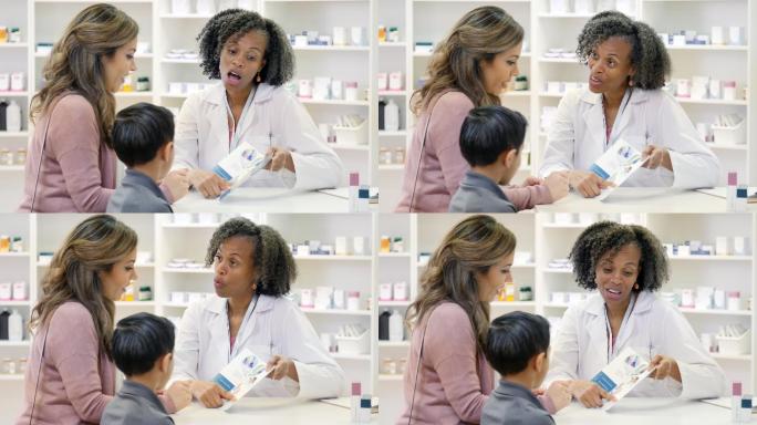 药剂师与中年妈妈讨论儿童疫苗