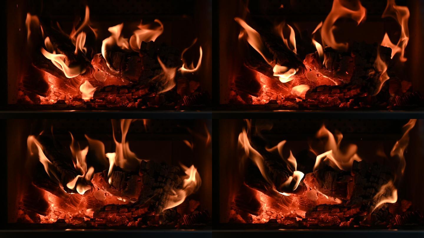 炉子壁炉里木火的温暖闪烁的火焰