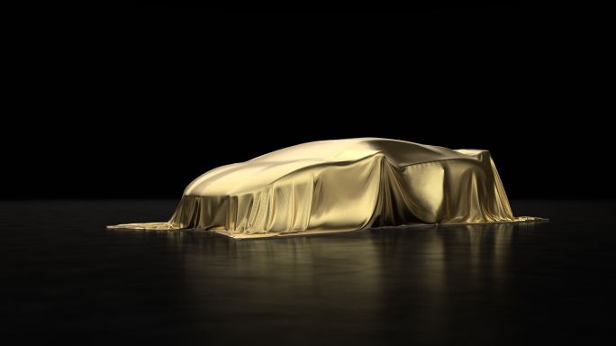 豪华跑车，覆盖金色面料。