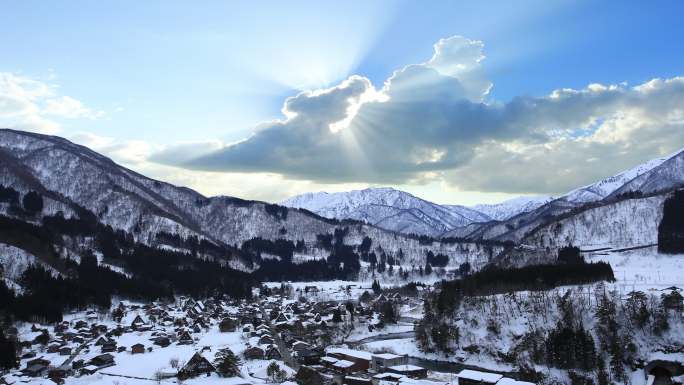 冬季小镇延时风景极寒地带寒冬圣光在雪山
