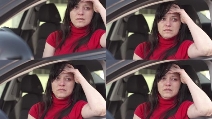 高清：女人在车里哭泣