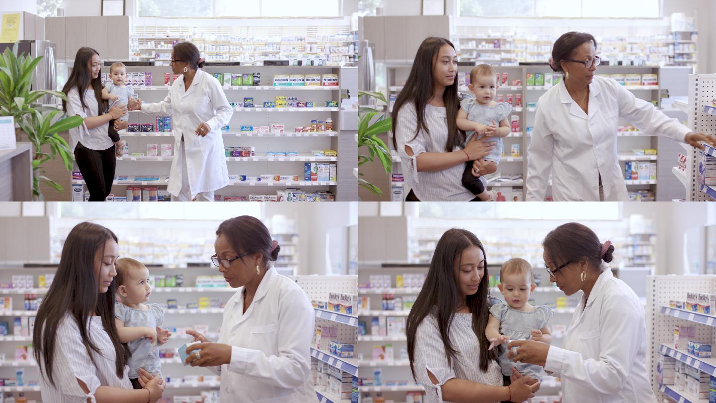 店员帮助带女婴的妇女选择药物