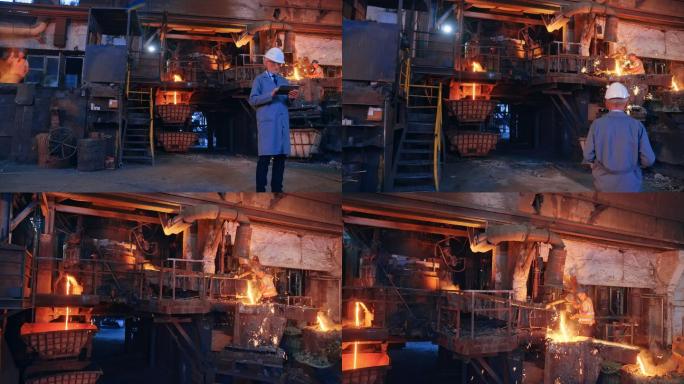 男工程师站在铸造厂，浇注熔融金属