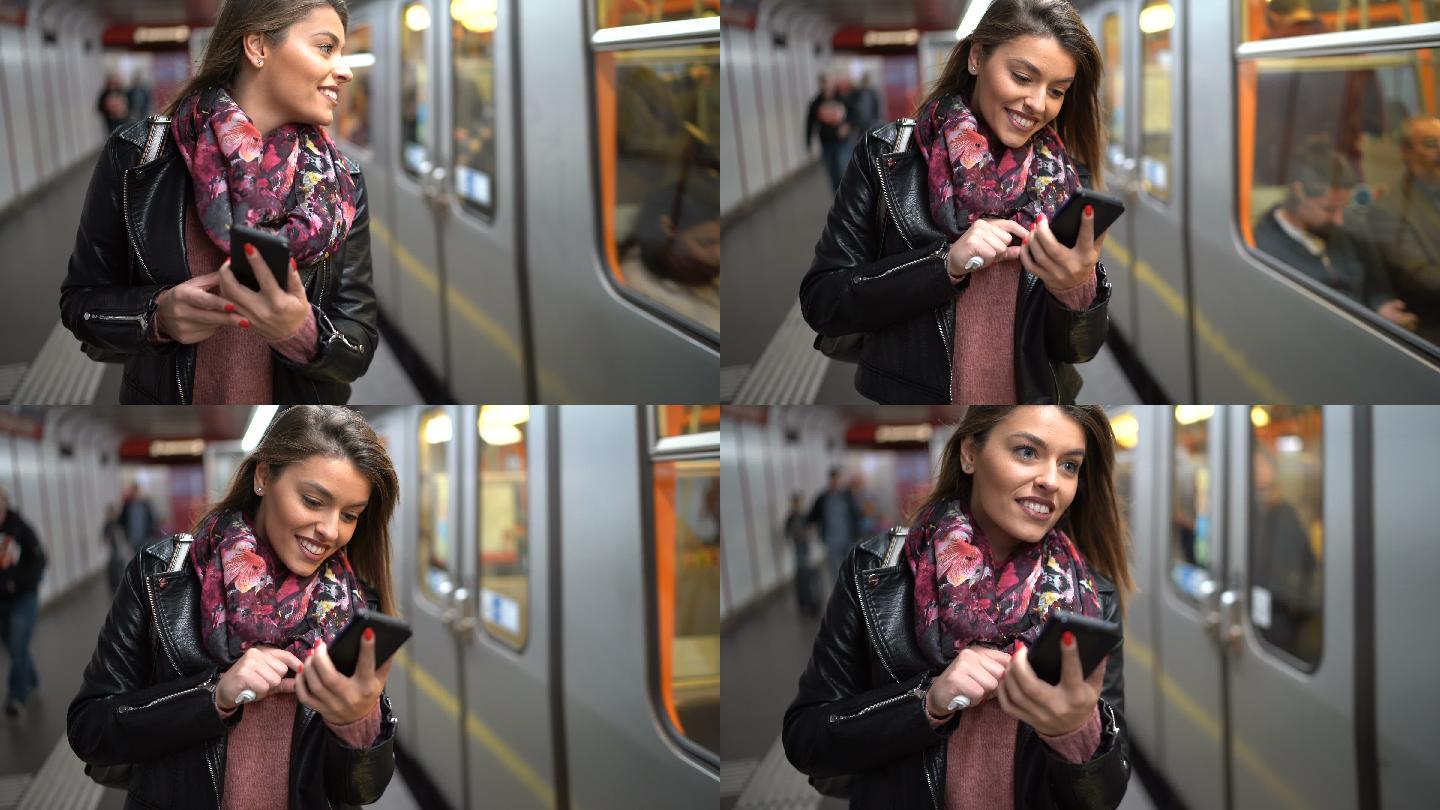 在地铁里发短信的年轻女子