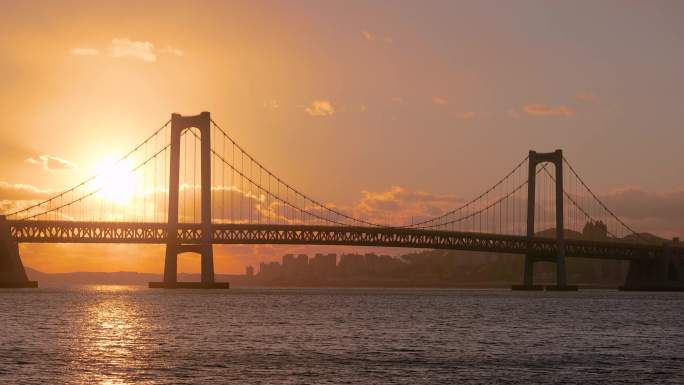 大连城市风光星海湾大桥日落夕阳海上建筑