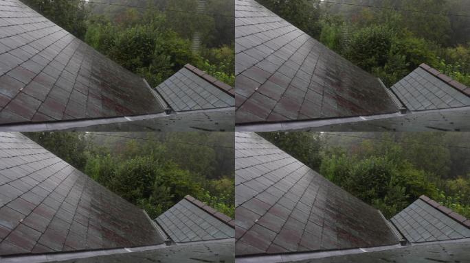 雨水打在屋顶上下雨雨季梅雨季节雨滴