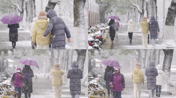 大雪中的行人背影