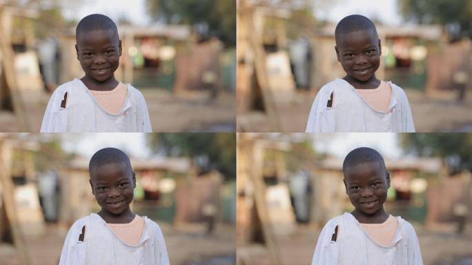 贫民窟的小男孩非洲黑人小孩微笑笑容面孔