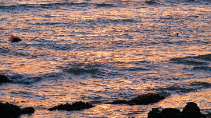 大海日落日出夕阳海水反光波光粼粼海面