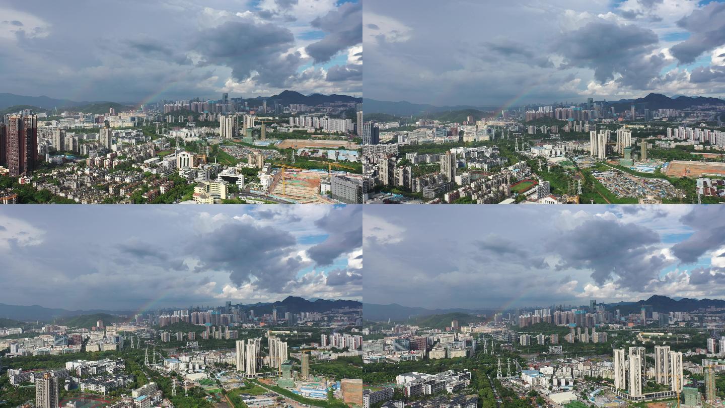深圳宝安中心区上空的雨后美丽七色彩虹