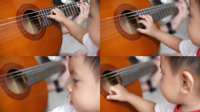 宝宝对吉他的兴趣弹吉他小孩子小孩玩耍