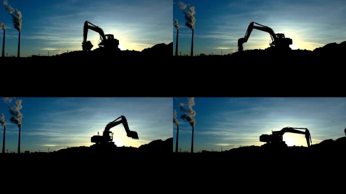 现代挖掘机在阳光照射下翻转和倾倒土壤