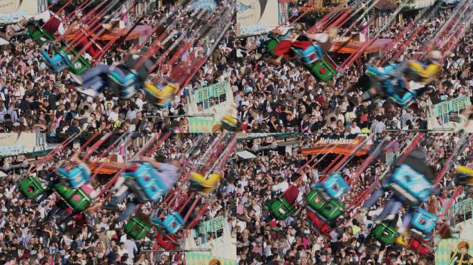 德国慕尼黑的人群慕尼黑狂欢节空中旋转飞车