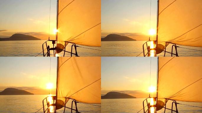 美丽的黎明航行夕阳朝阳出海度假游艇帆船