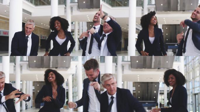 一组商人在现代办公室跳舞的4k视频片段