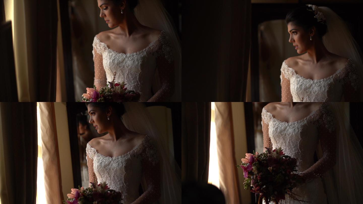 婚礼前，新娘手持花束，透过窗户观看