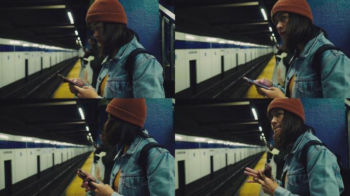 游客在纽约地铁站站台候车。