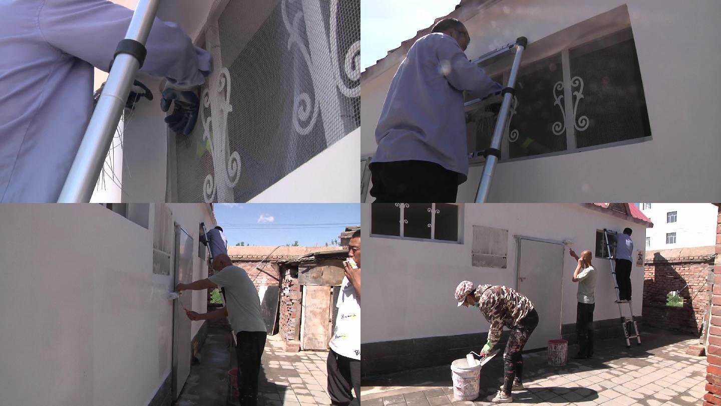 城管综合执法局工人修理公厕给外墙刷漆