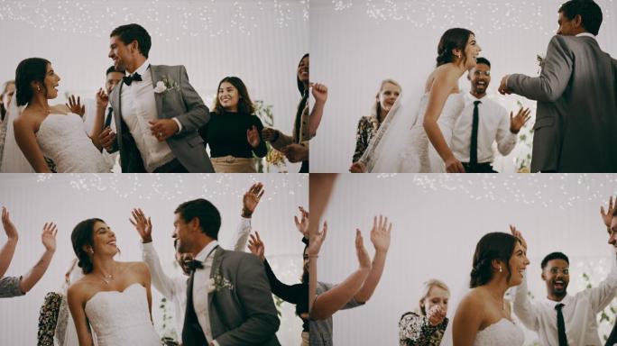 一对幸福夫妇在婚礼上与朋友一起跳舞
