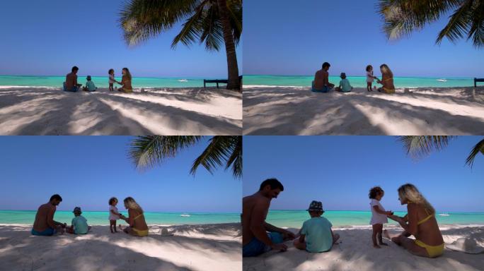一家人在沙滩上聊天
