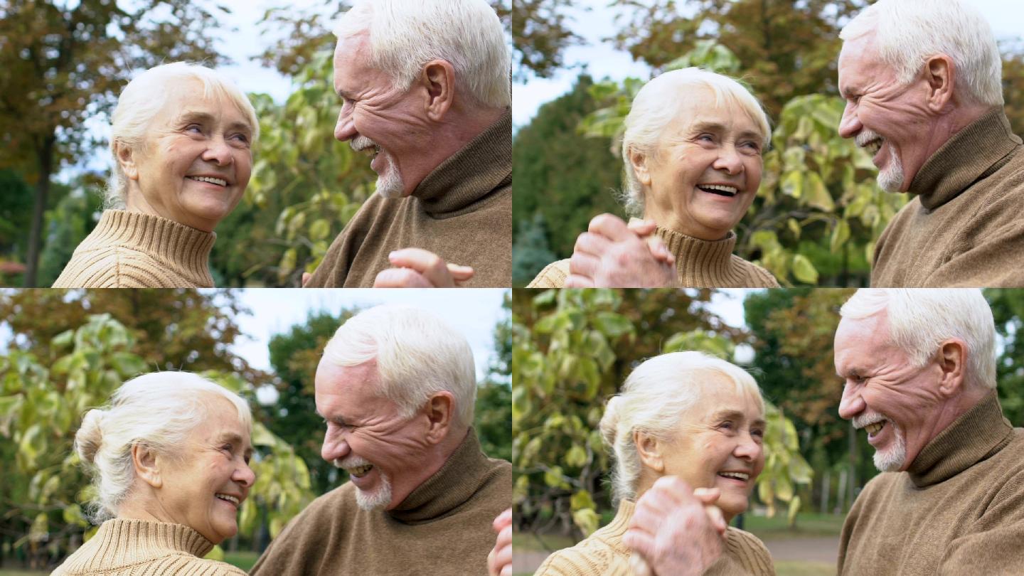 情侣在公园跳舞白发老人晚年生活夫妇