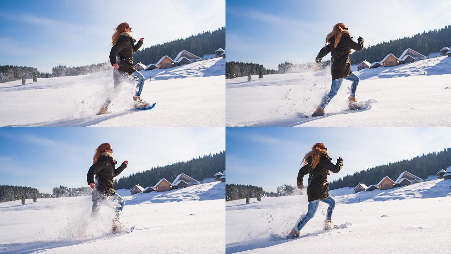穿着雪鞋在雪地里跑步