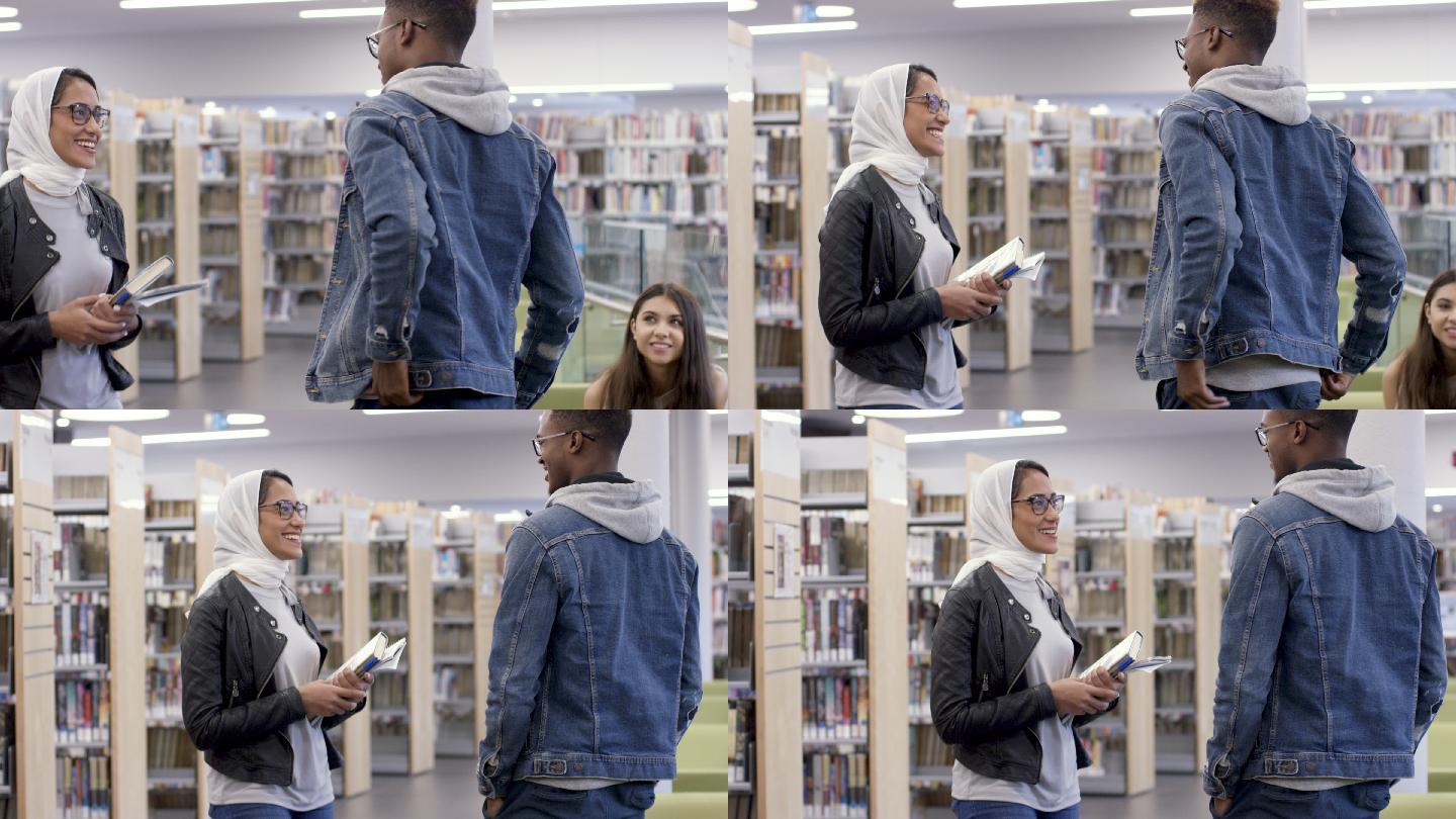 两人在图书馆里拥抱打招呼
