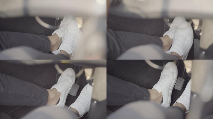 男性脚在汽车中行驶的特写镜头