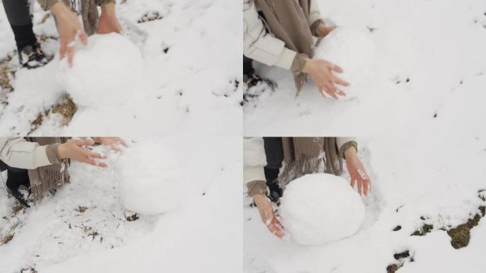 冬天下雪滚雪球堆雪人雪地玩耍雪景意境素材