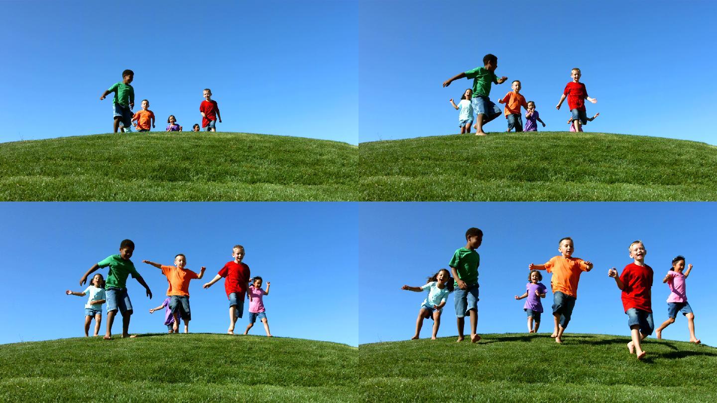 一群孩子在草地奔跑
