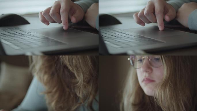 一个十几岁的女孩在家用笔记本电脑做功课。
