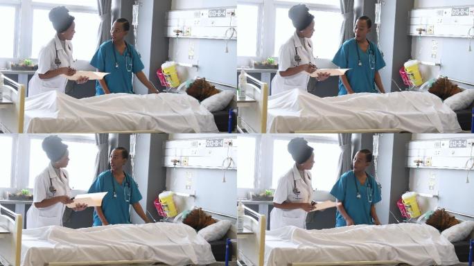 女医生和护士在病人床边谈话