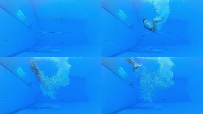 一名潜水员落在游泳池中