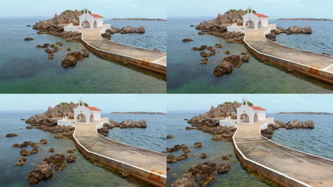 古典白色希腊教堂岩石海岸线宗教旅游目的地