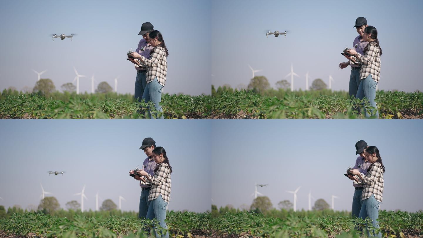 两个农民使用无人机在农民智能农场一起工作
