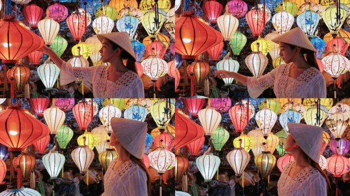 女人在挑选灯笼节日花灯灯笼花灯