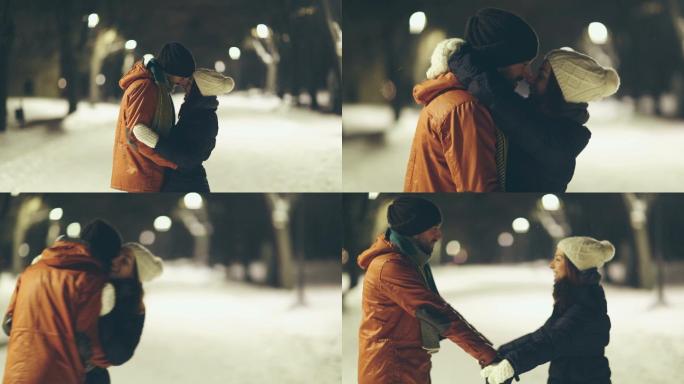 一对情侣在美丽的冬夜散步
