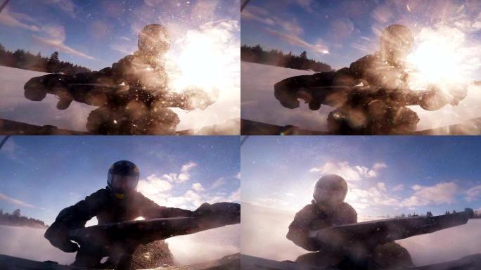 一位快速摩托雪橇司机的特写镜头