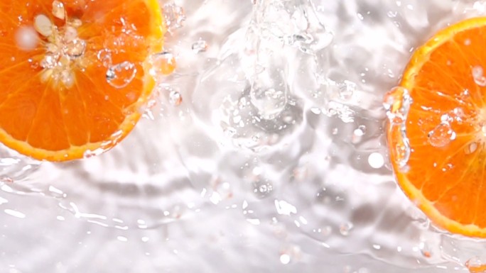 橙子落在水上飞溅橘子主图生鲜成熟果子黄色