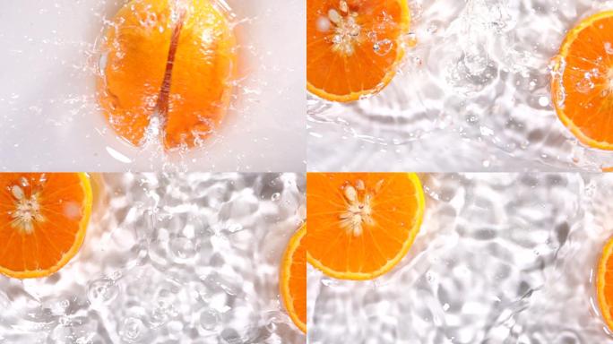 橙子落在水上飞溅橘子主图生鲜成熟果子黄色