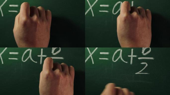 在黑板上写方程式的手