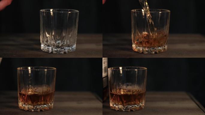 将威士忌倒入玻璃杯的超慢镜头