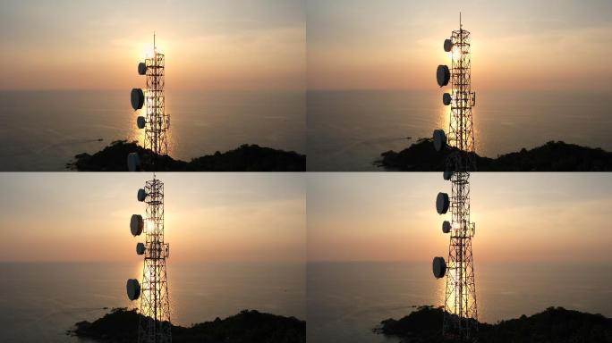 岛上电信天线日落的鸟瞰图