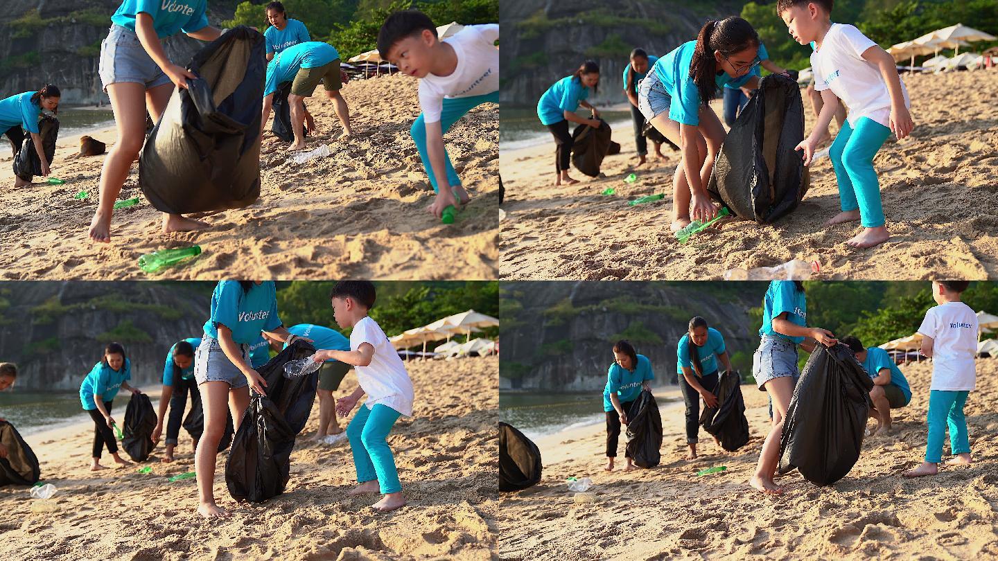 志愿者从沙滩上捡垃圾。