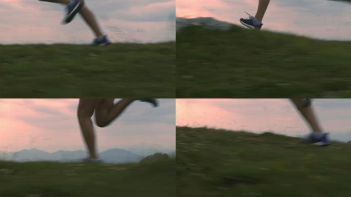 在山脊上跑步的女性跑步者腿部的慢镜头。